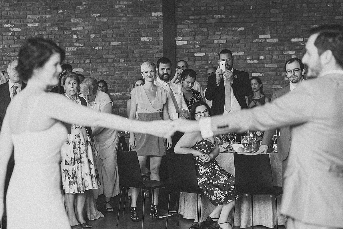 Photojournalistic romantic wedding reception photography at the Roundhouse, Beacon, NY by Clean Plate Pictures, Hudson Valley wedding photographer