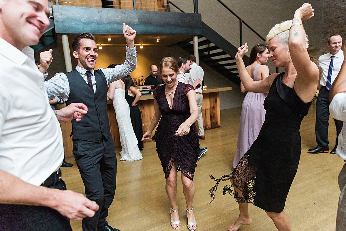 Candid wedding reception dancing photos at a Roundhouse, Beacon NY wedding by Clean Plate Pictures, Hudson Valley wedding photographer.