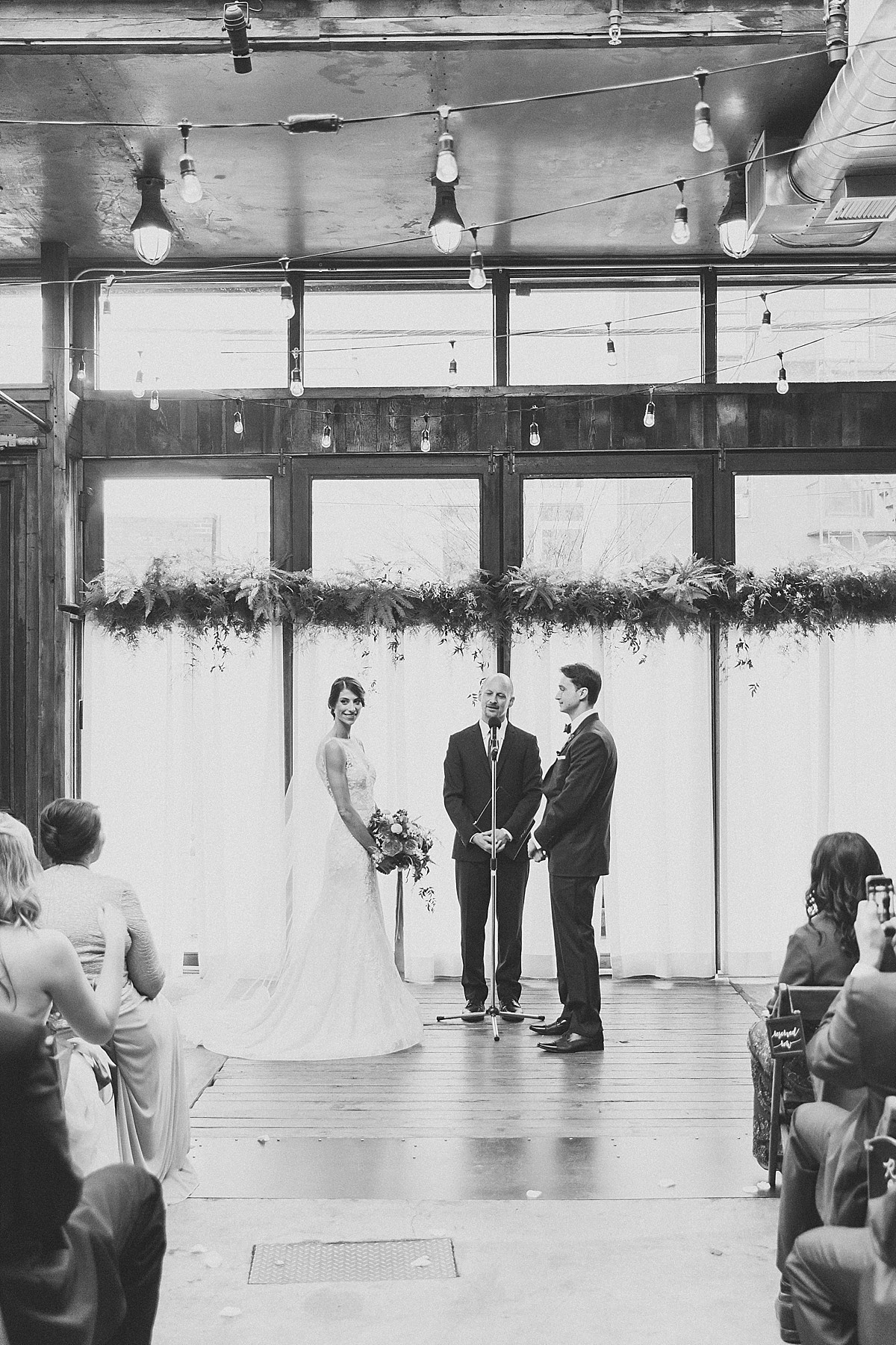Authentic, candid ceremony photography at the Brooklyn Winery in Williamsburg, by Clean Plate Pictures, Brooklyn wedding photographer.